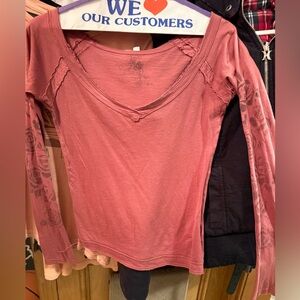 Muted rose colored wide v neck almost off shoulders long sleeve shirt w roses